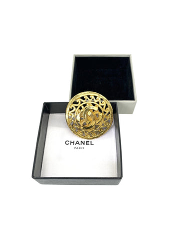 CHANEL Women's Gold CC Round Brooch in A Condition in Gold