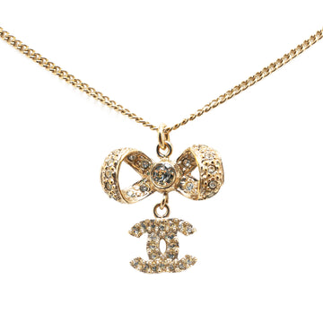 CHANEL Gold Plated CC Crystal Ribbon Bow Pendant Necklace Costume Necklace