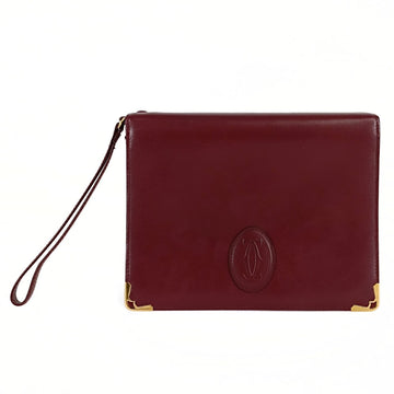 CARTIER clutch bag with burgundy leather handle