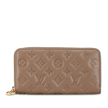 LOUIS VUITTON Monogram Embossed Coussin Zippy Wallet Long Wallets