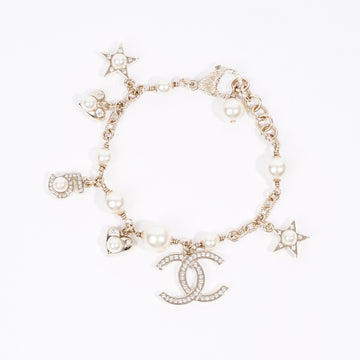 Chanel Heart And CC Charm Bracelet Pale Gold / Pearl Base Metal