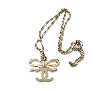 CHANEL Light Gold Ribbon Bow CC Necklace