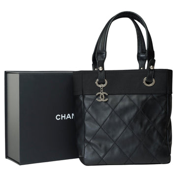 CHANEL Paris-Biarritz Tote bag in black coated canvas , SHW