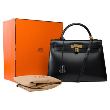 HERMES Stunning Kelly 32 sellier handbag strap in Black Box Calf leather, GHW