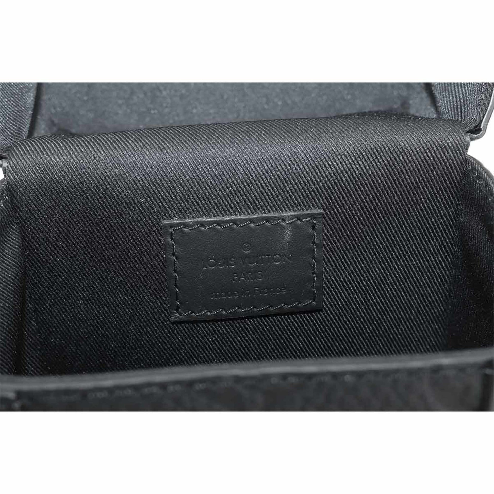 Túi Louis Vuitton Vertical Trunk Wearable Wallet (M82007