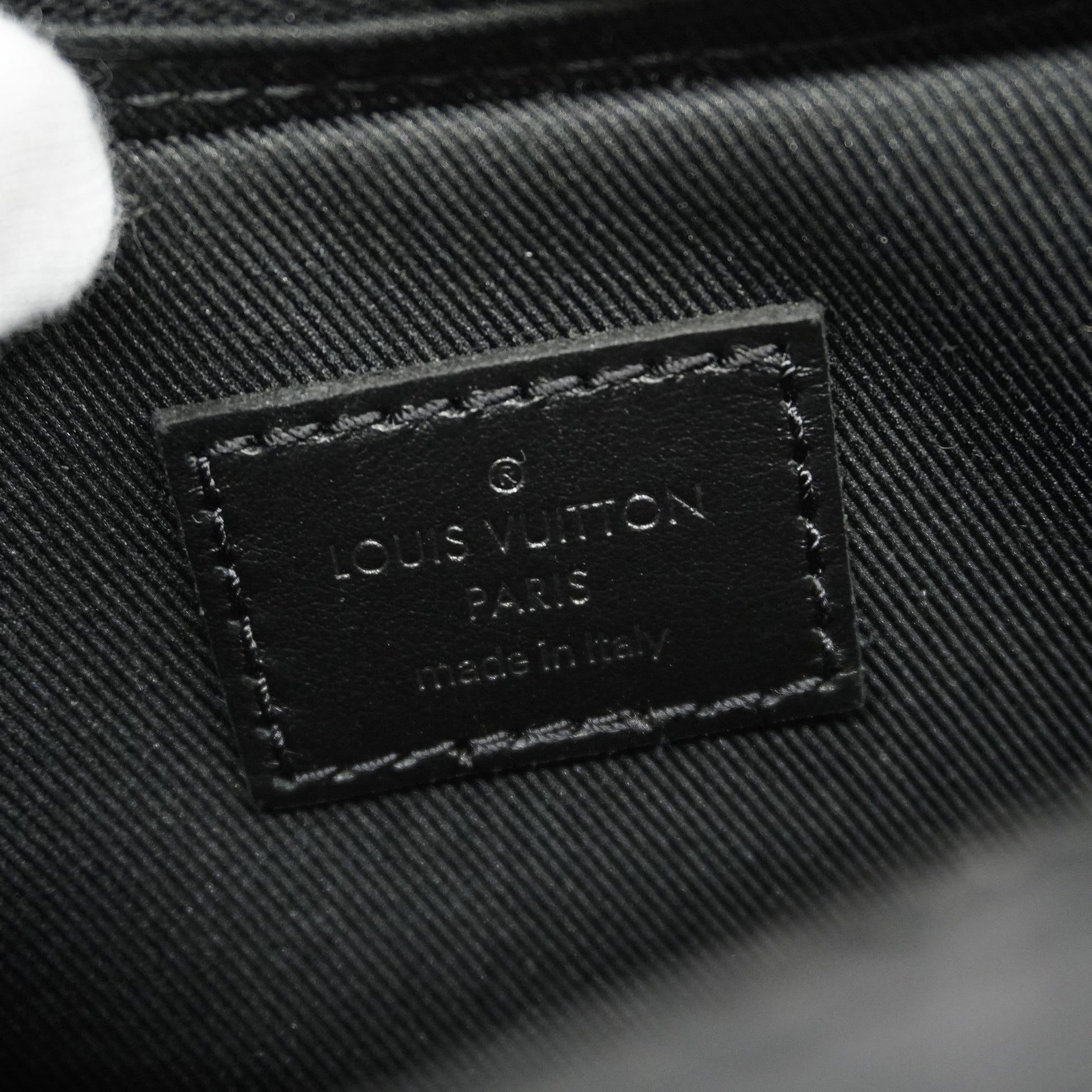 Louis Vuitton® Vertical Trunk Wearable Wallet Eclipse. Size in