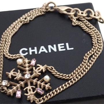 CHANEL Bracelet Coco Mark Snowflake Gold x Pink Metal Material Rhinestone Bangle Chain Women's