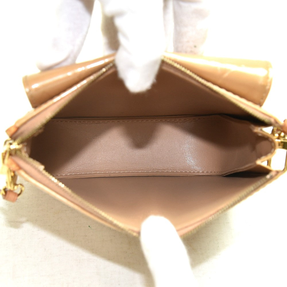 Louis Vuitton Mott Brown Patent Leather Clutch Bag (Pre-Owned)