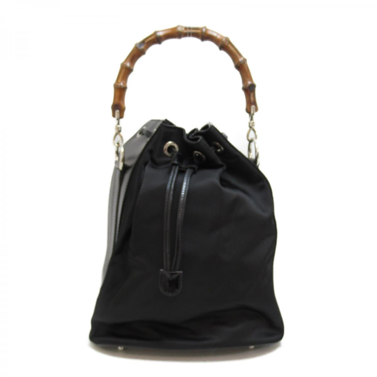 Vintage authentic Gucci black bucket patent leather shoulder bag.