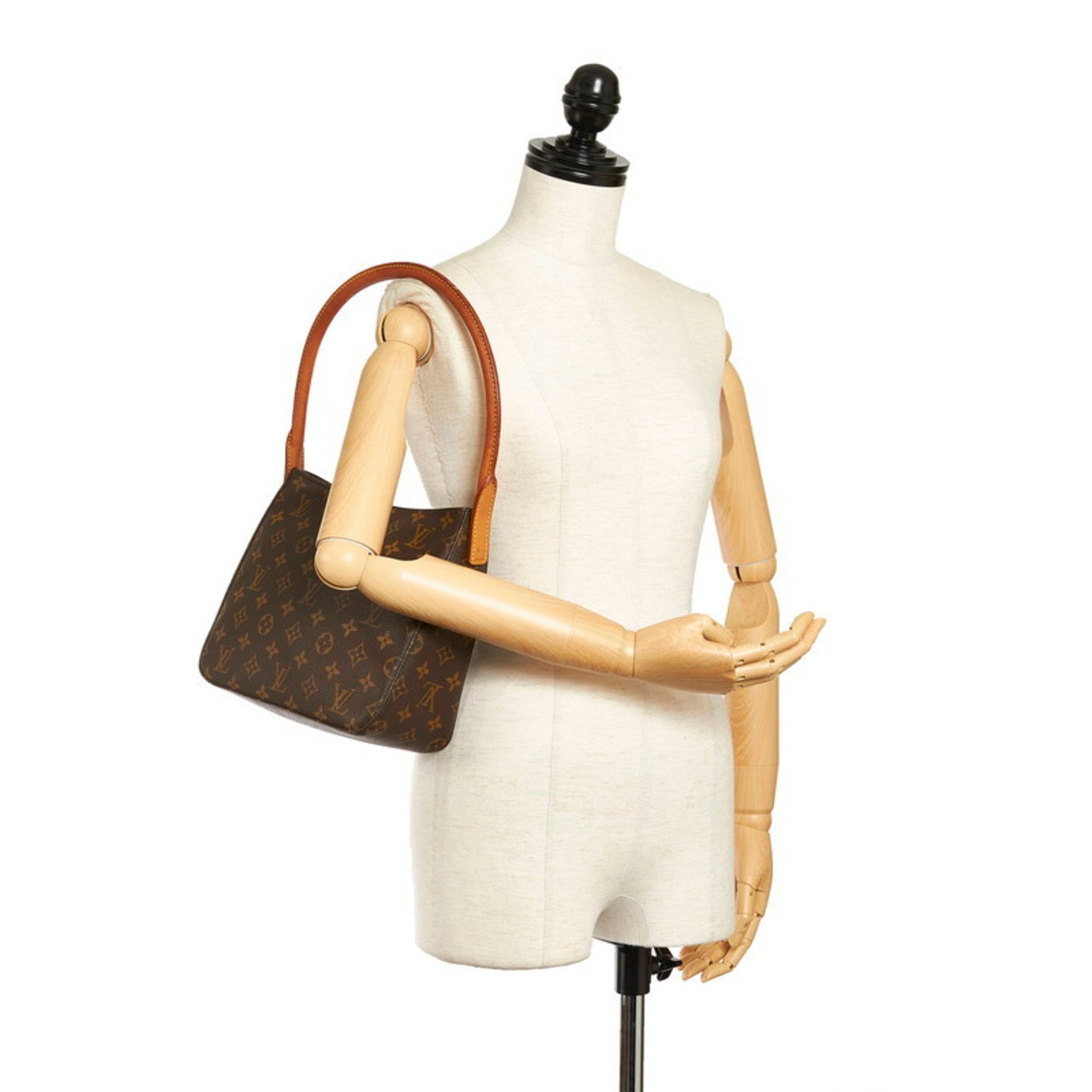 Looping cloth handbag Louis Vuitton Brown in Cloth - 34357053