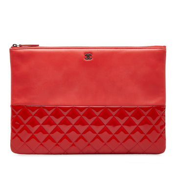 CHANEL Quilted O Case Clutch Bag