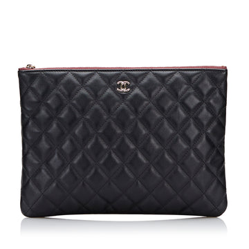 Chanel Quilted O Case Clutch Bag