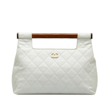 CHANEL Quilted Caviar Wood Handle Tote Bag