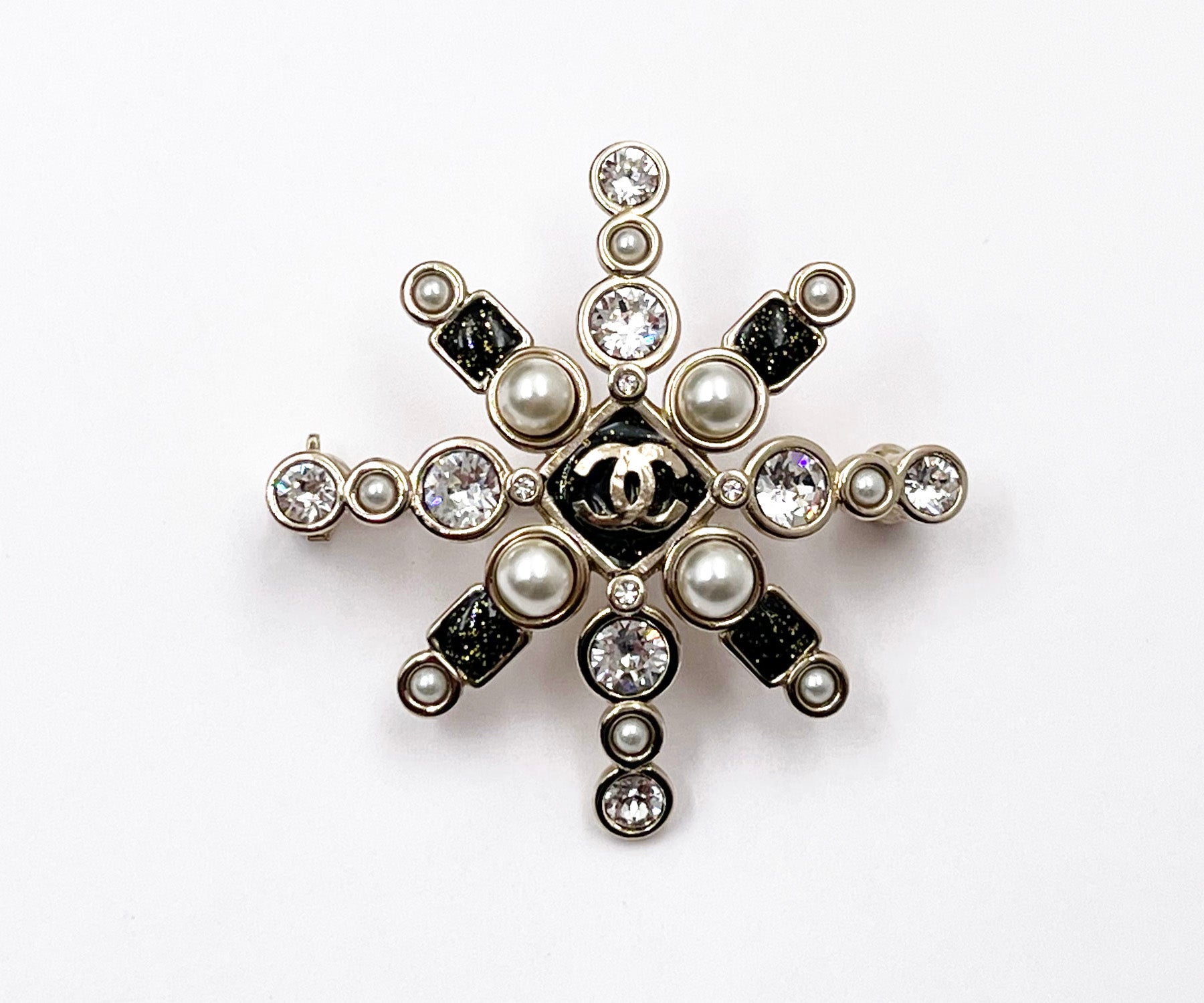 Chanel star store brooch