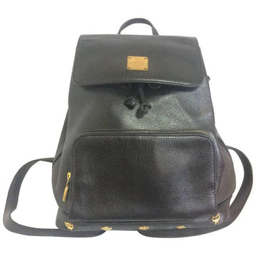 MCM Vintage black leather backpack with golden studded logo motifs