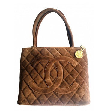 CHANEL Vintage brown suede classic tote bag with large CC mark and golden CC medal charm to the zipper