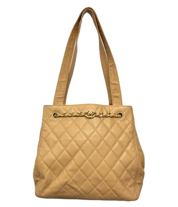 CHANEL Vintage beige caviar leather shoulder bag, tote bag with chains and turn lock CC closure