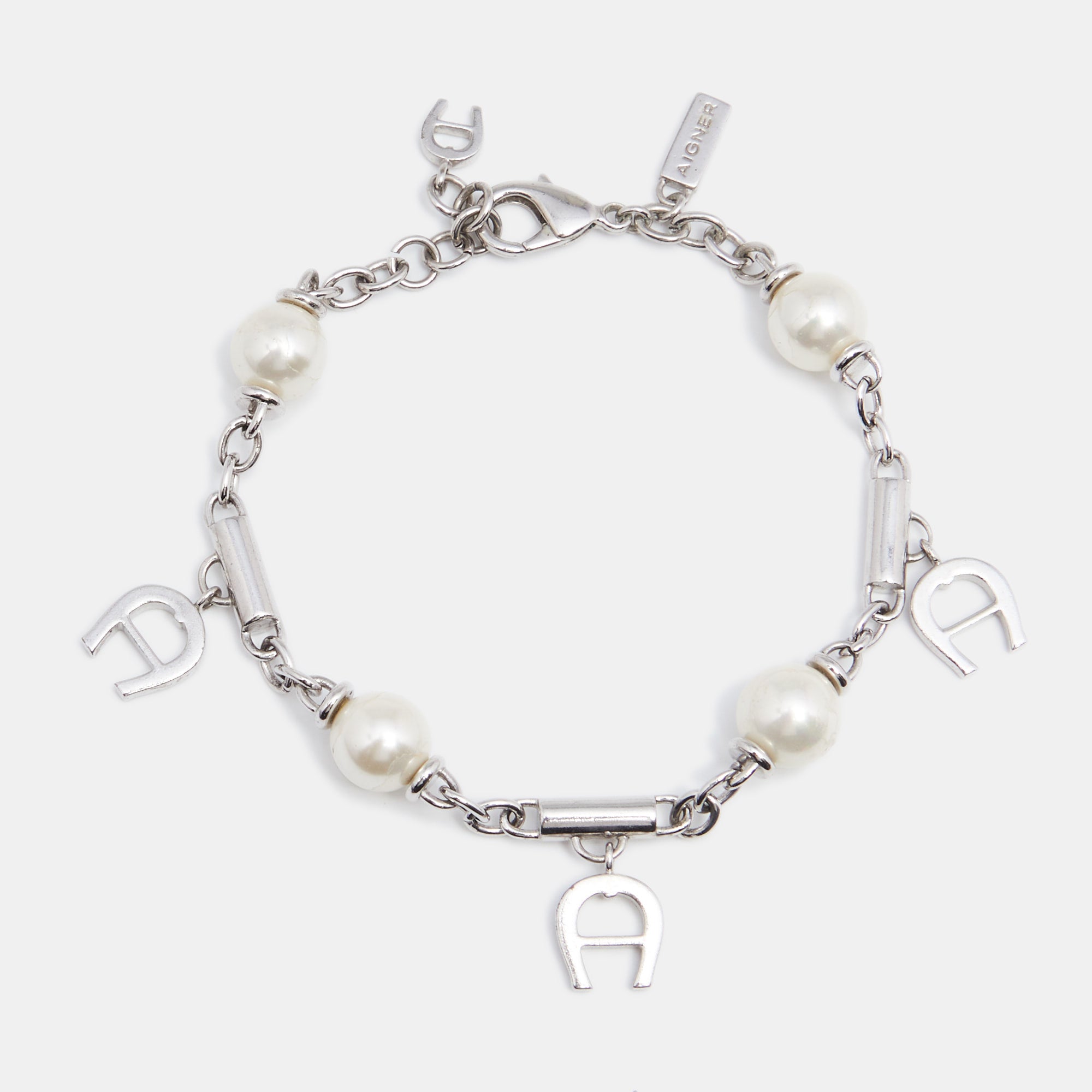 AIGNER Silver Tone Logo Charms Pearl Station Bracelet