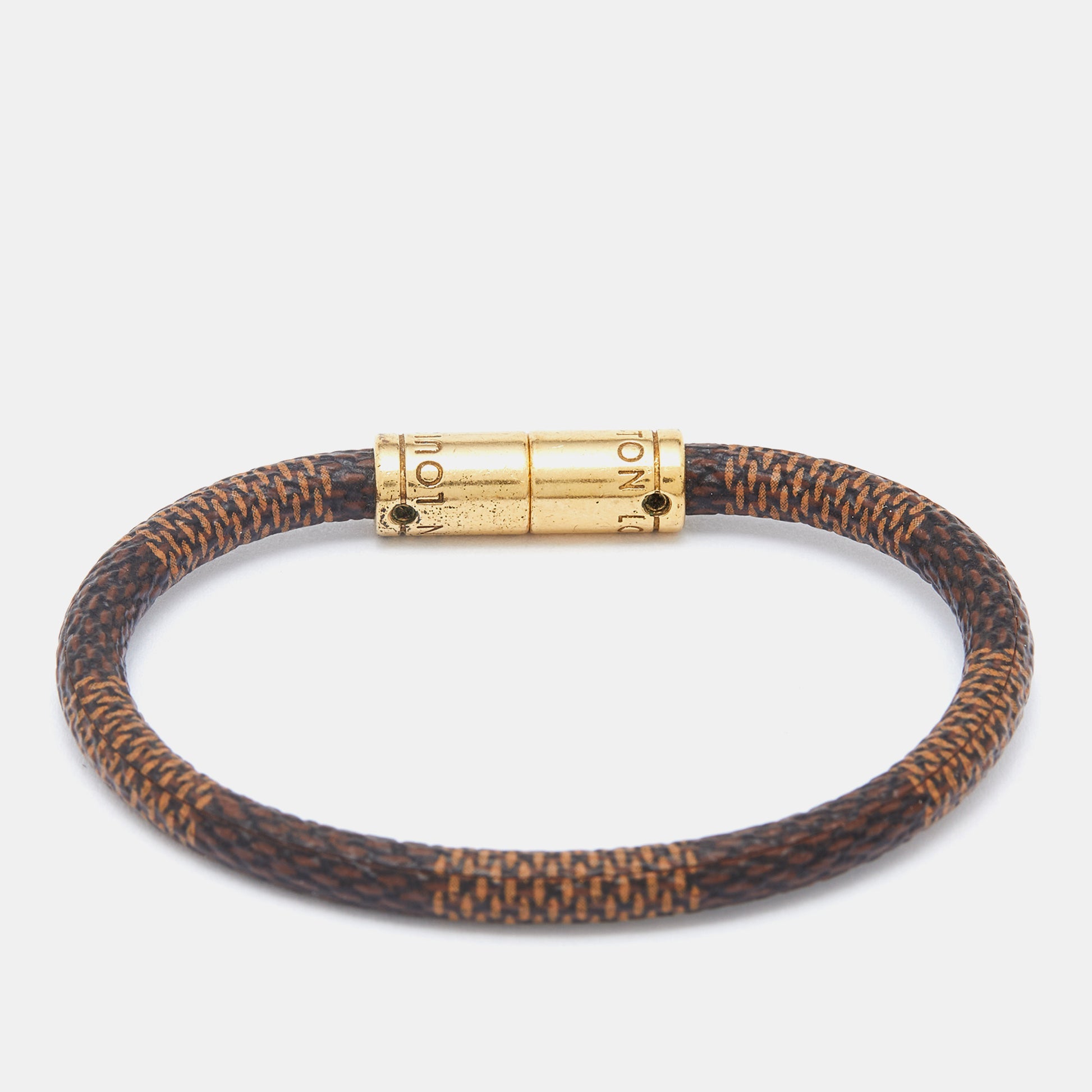 Vintage and Musthaves. Louis Vuitton keep it damier gold bracelet