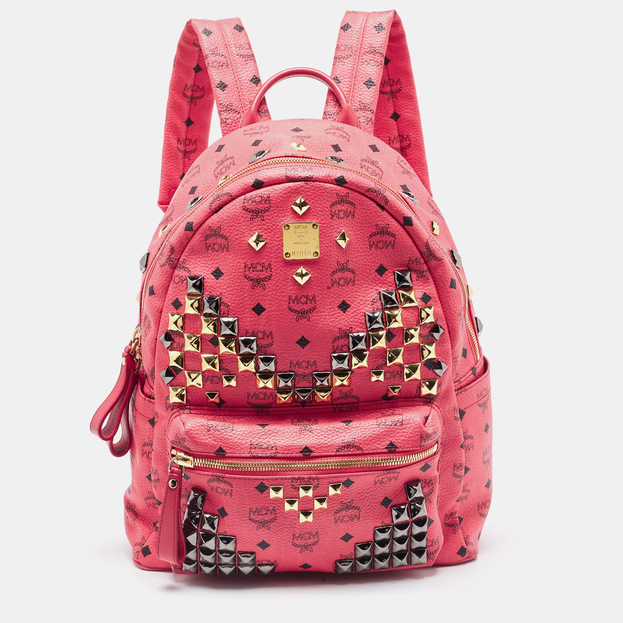 Mcm large cheap studded backpack