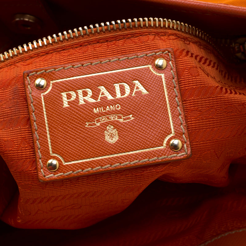 Vintage orange 2024 prada bag