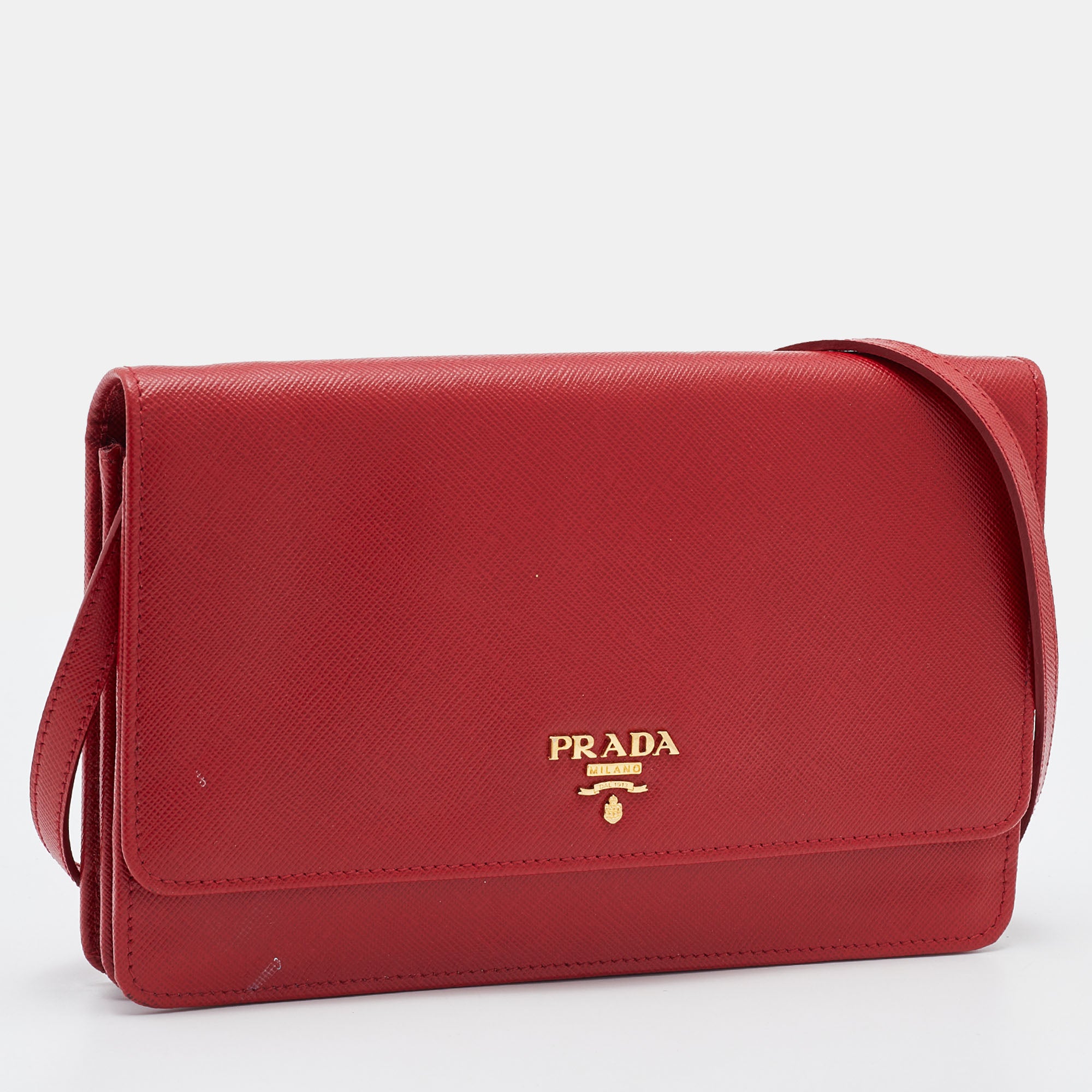 Vintage Prada red saffiano leather shoulder bag. Good used condition buy with minima