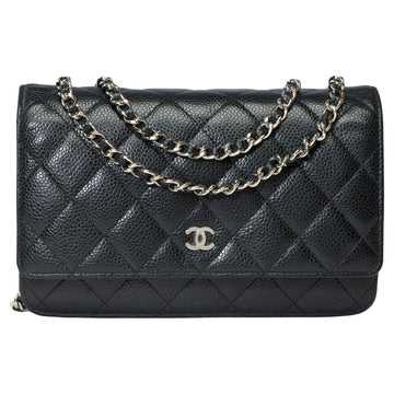 CHANEL Wallet on Chain [WOC] shoulder bag in Black quilted Caviar leather, SHW